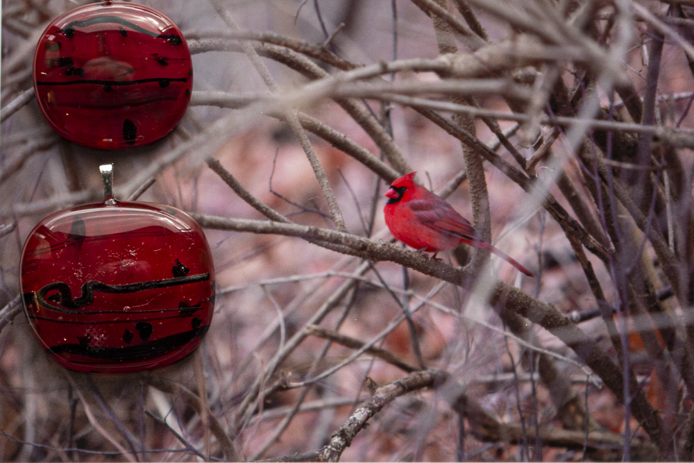 Red bird with musical double pendants